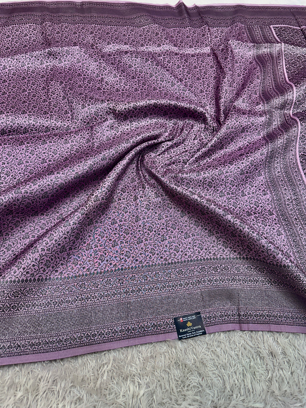 STF52 – Graceful Lavender Dupion Saree with All-Over Floral Woven Designs