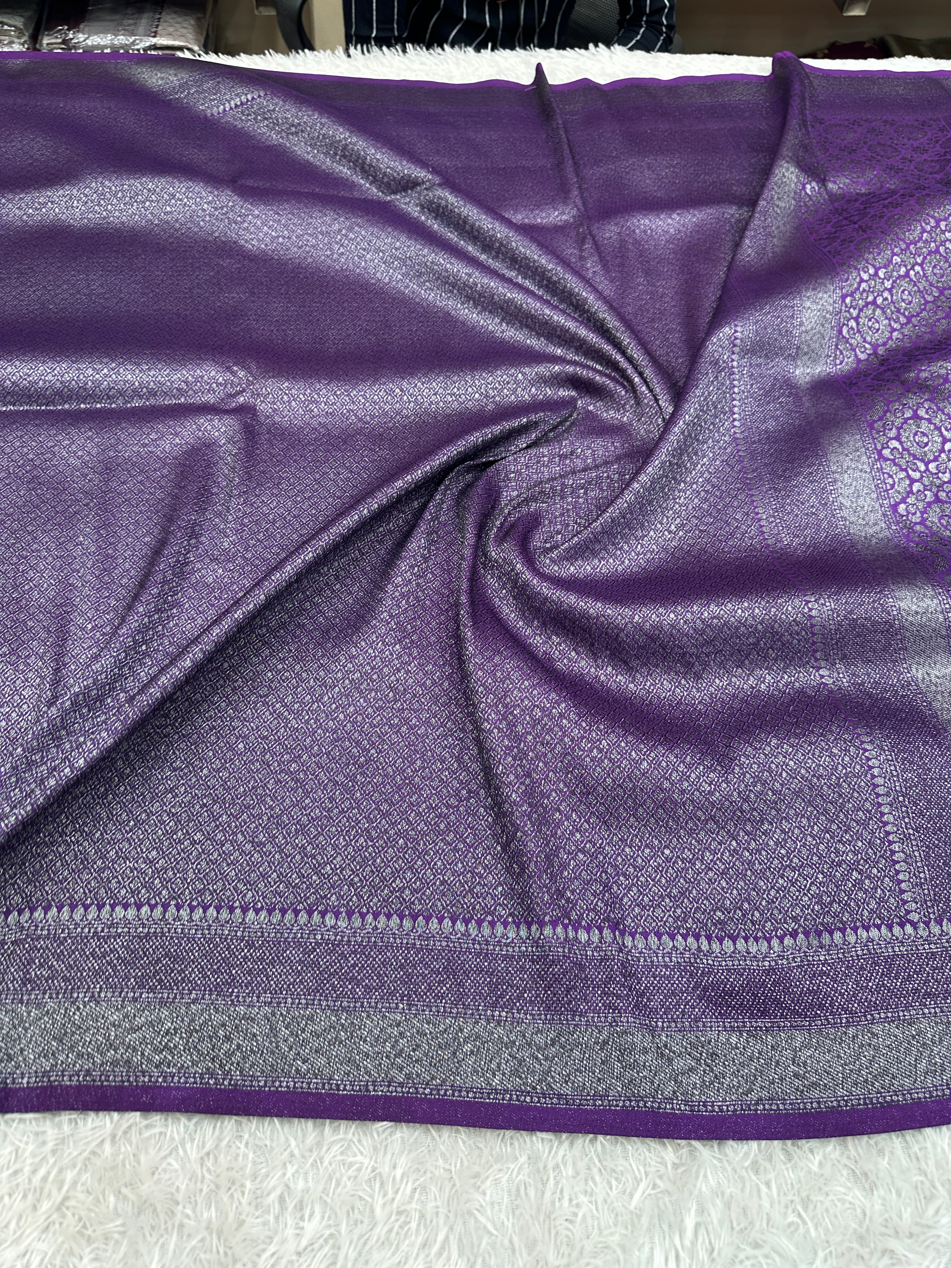 STF56 – Regal Purple Dupion Saree with Embossed Square Woven Designs