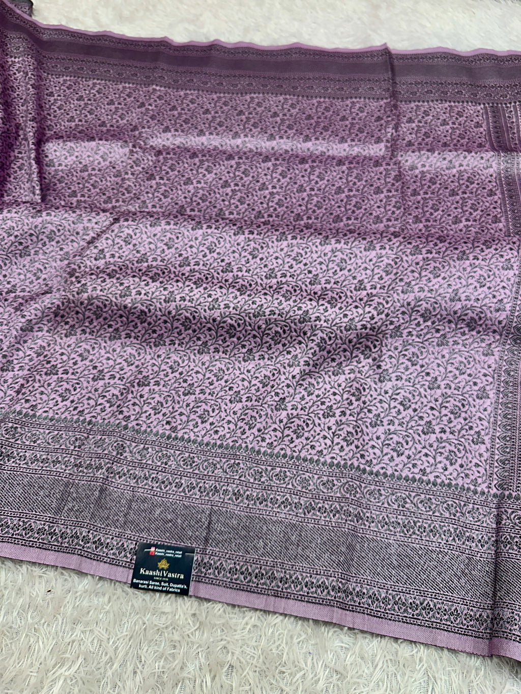 STF52 – Graceful Lavender Dupion Saree with All-Over Floral Woven Designs