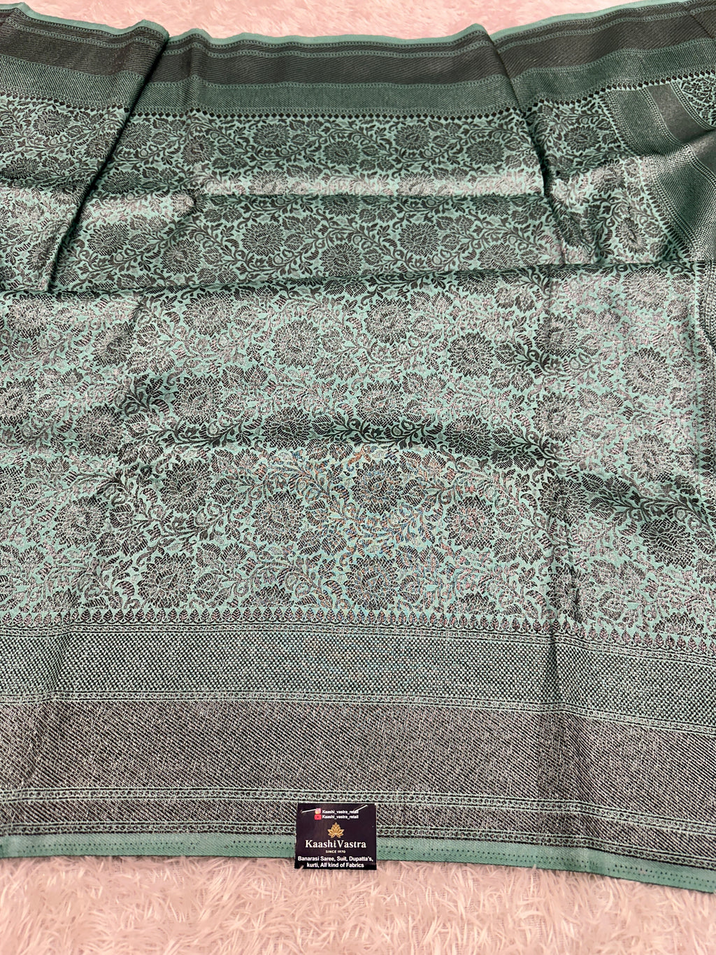STF49 – Enchanting Sea Green Dupion Saree with Embossed Floral Woven Designs