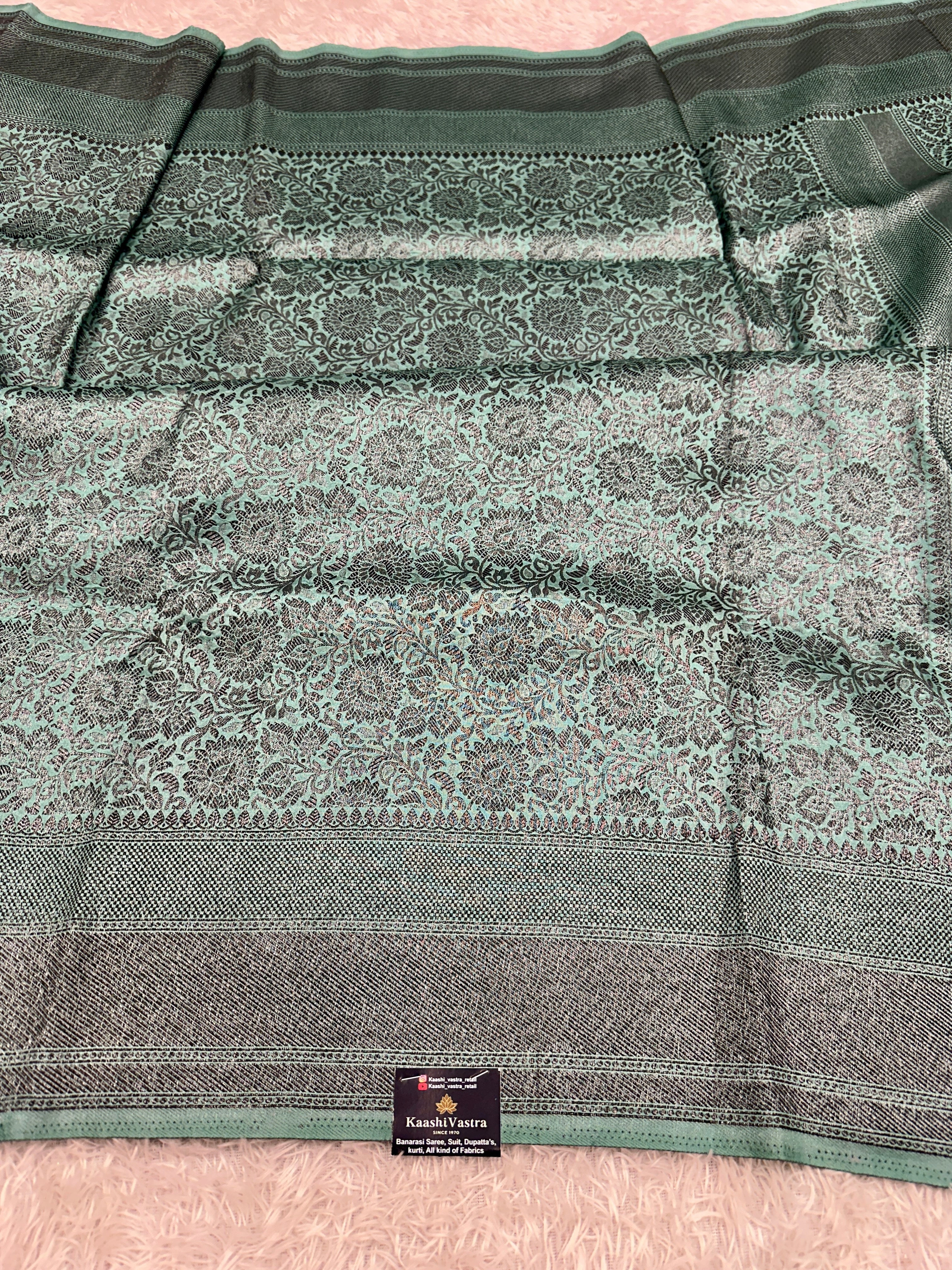 STF49 – Enchanting Sea Green Dupion Saree with Embossed Floral Woven Designs