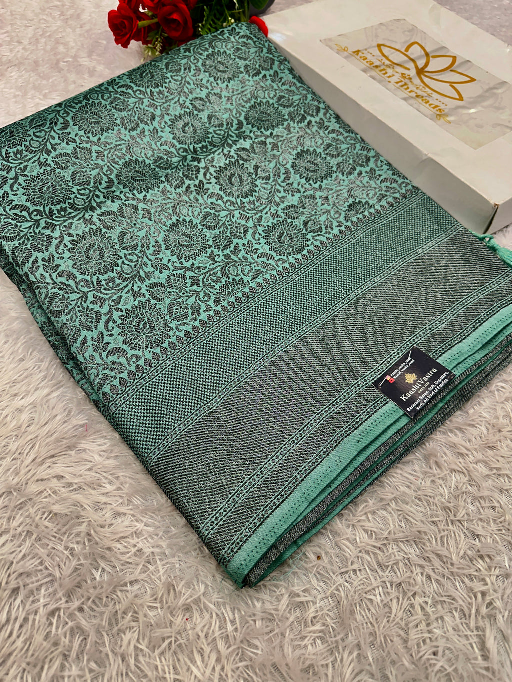 STF49 – Enchanting Sea Green Dupion Saree with Embossed Floral Woven Designs