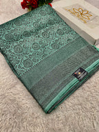 STF49 – Enchanting Sea Green Dupion Saree with Embossed Floral Woven Designs
