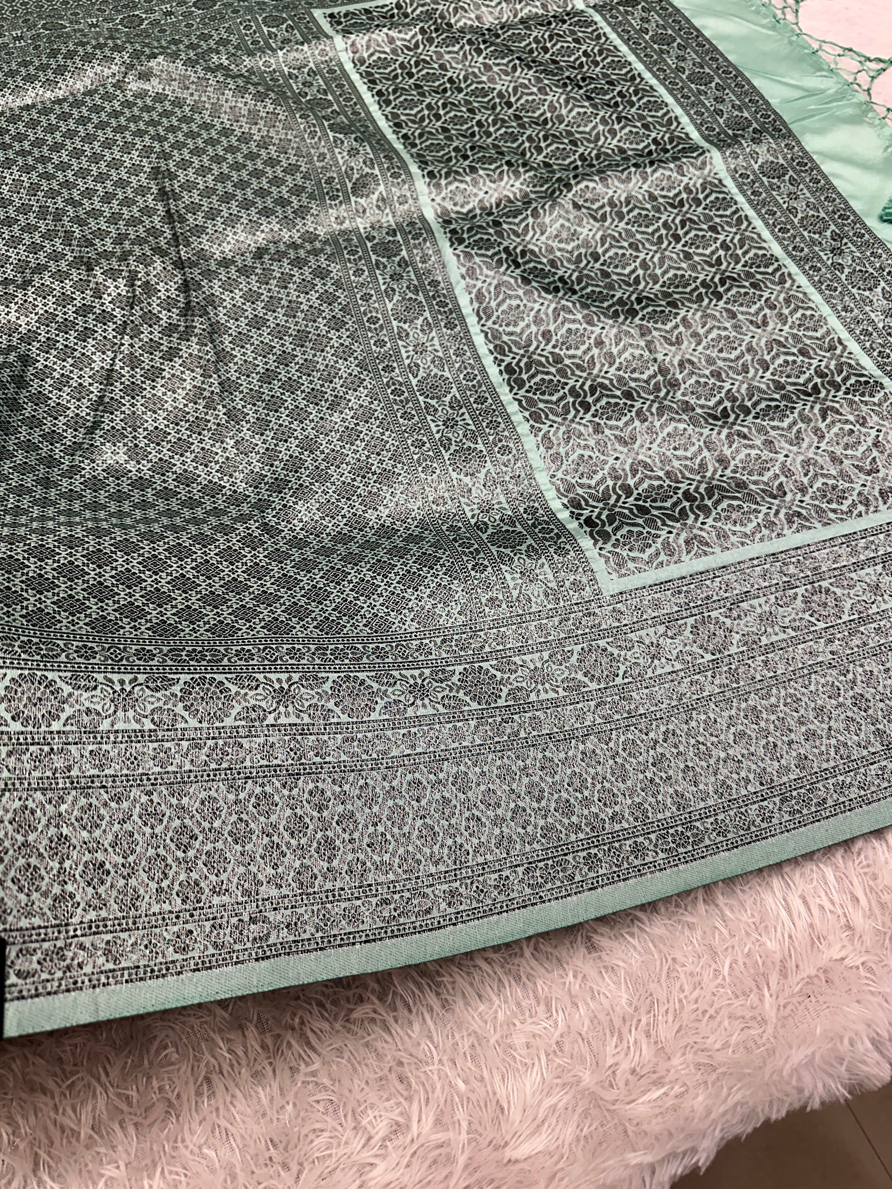 STF50 – Elegant Sea Green Dupion Saree with Embossed Woven Designs