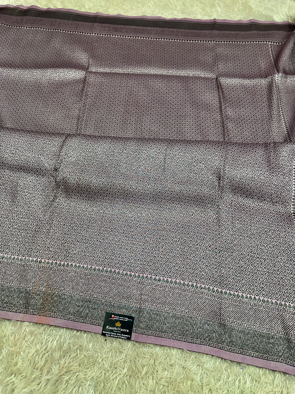 STF55 – Elegant Lavender Dupion Saree with Embossed Square Woven Designs