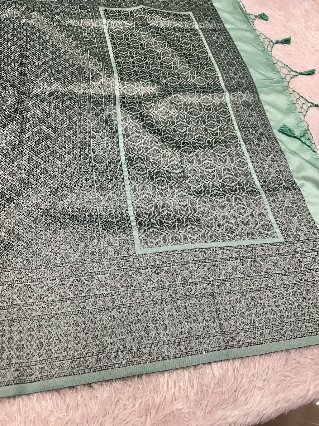 STF50 – Elegant Sea Green Dupion Saree with Embossed Woven Designs