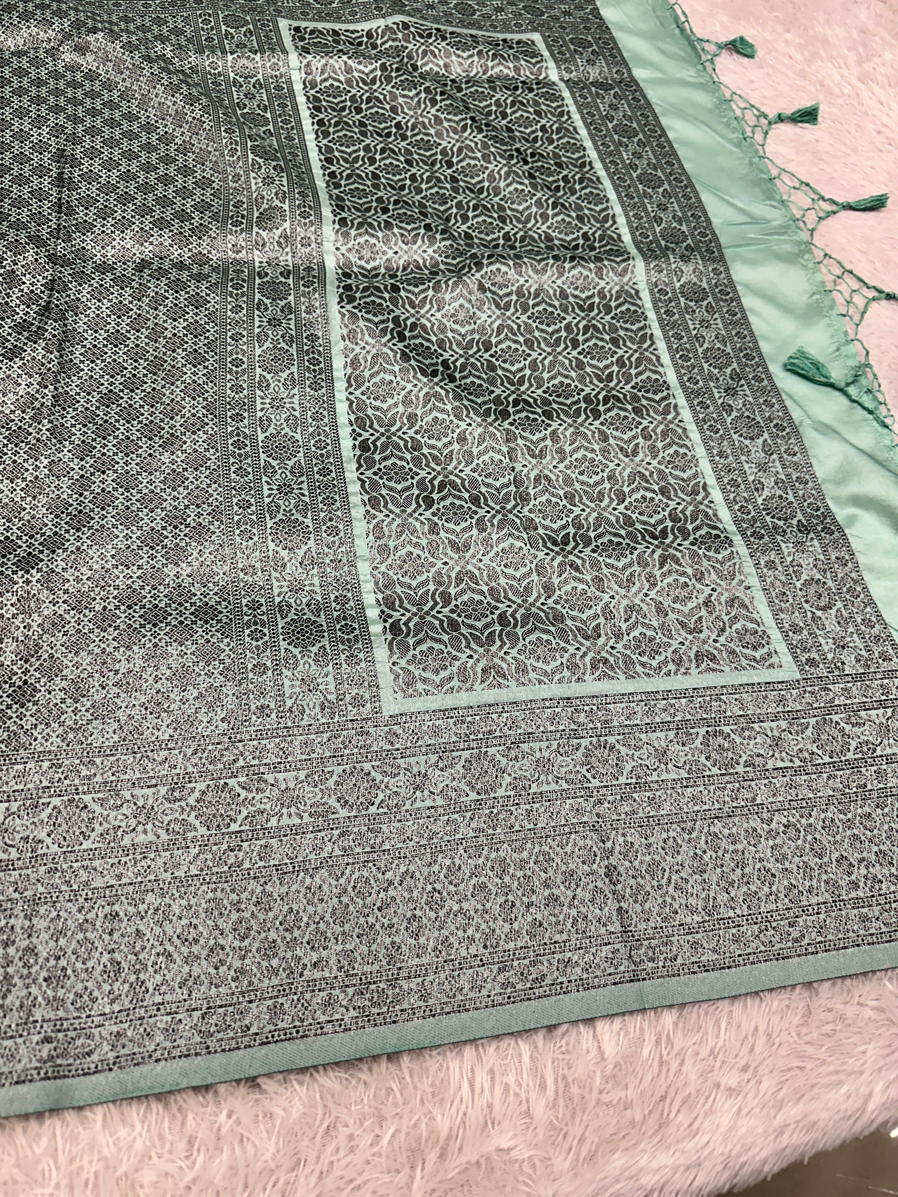 STF50 – Elegant Sea Green Dupion Saree with Embossed Woven Designs