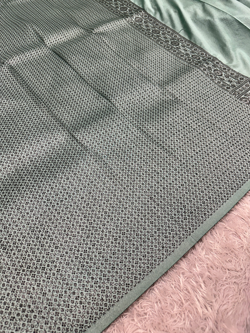 STF50 – Elegant Sea Green Dupion Saree with Embossed Woven Designs