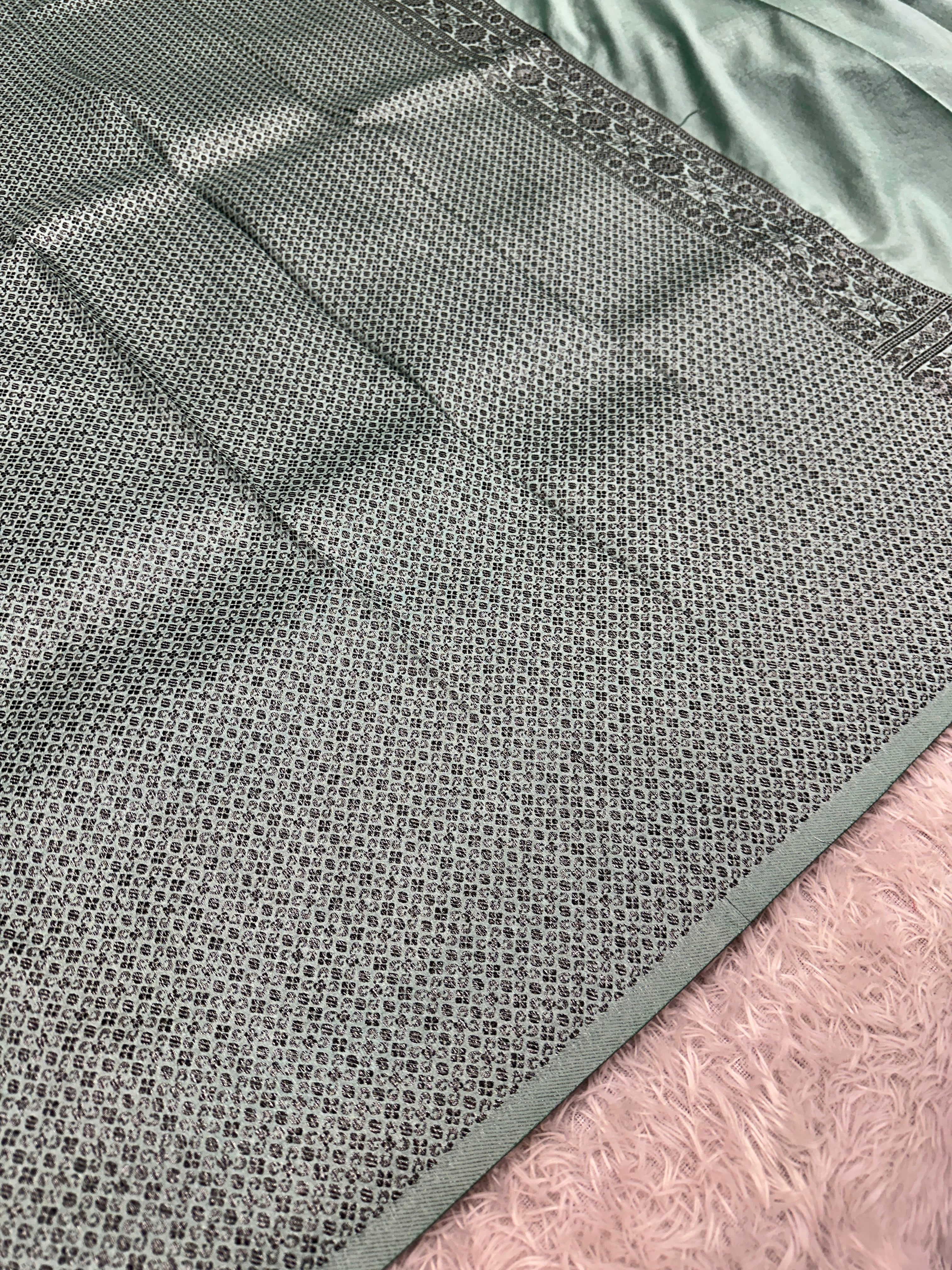 STF50 – Elegant Sea Green Dupion Saree with Embossed Woven Designs