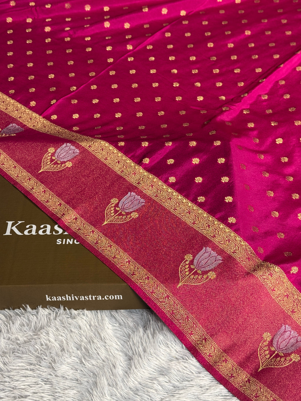 Product Title:
Rani Pink Semi Crepe Georgette Saree with All Over Buta Woven Design & Rich Zari Pallu | SS52