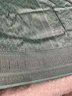 STF51 – Charming Sea Green Dupion Saree with All-Over Floral Woven Designs