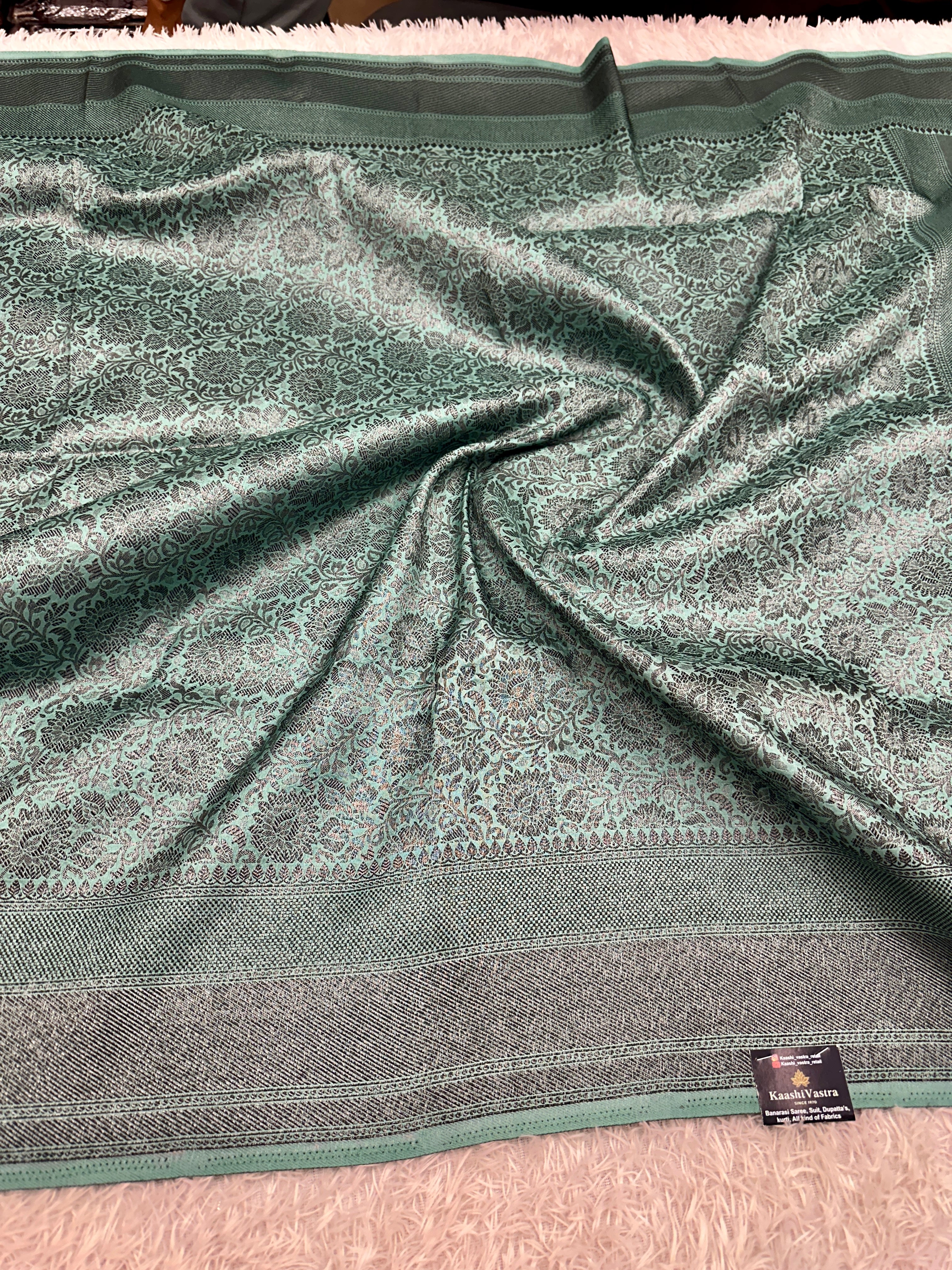 STF49 – Enchanting Sea Green Dupion Saree with Embossed Floral Woven Designs