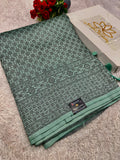 STF50 – Elegant Sea Green Dupion Saree with Embossed Woven Designs