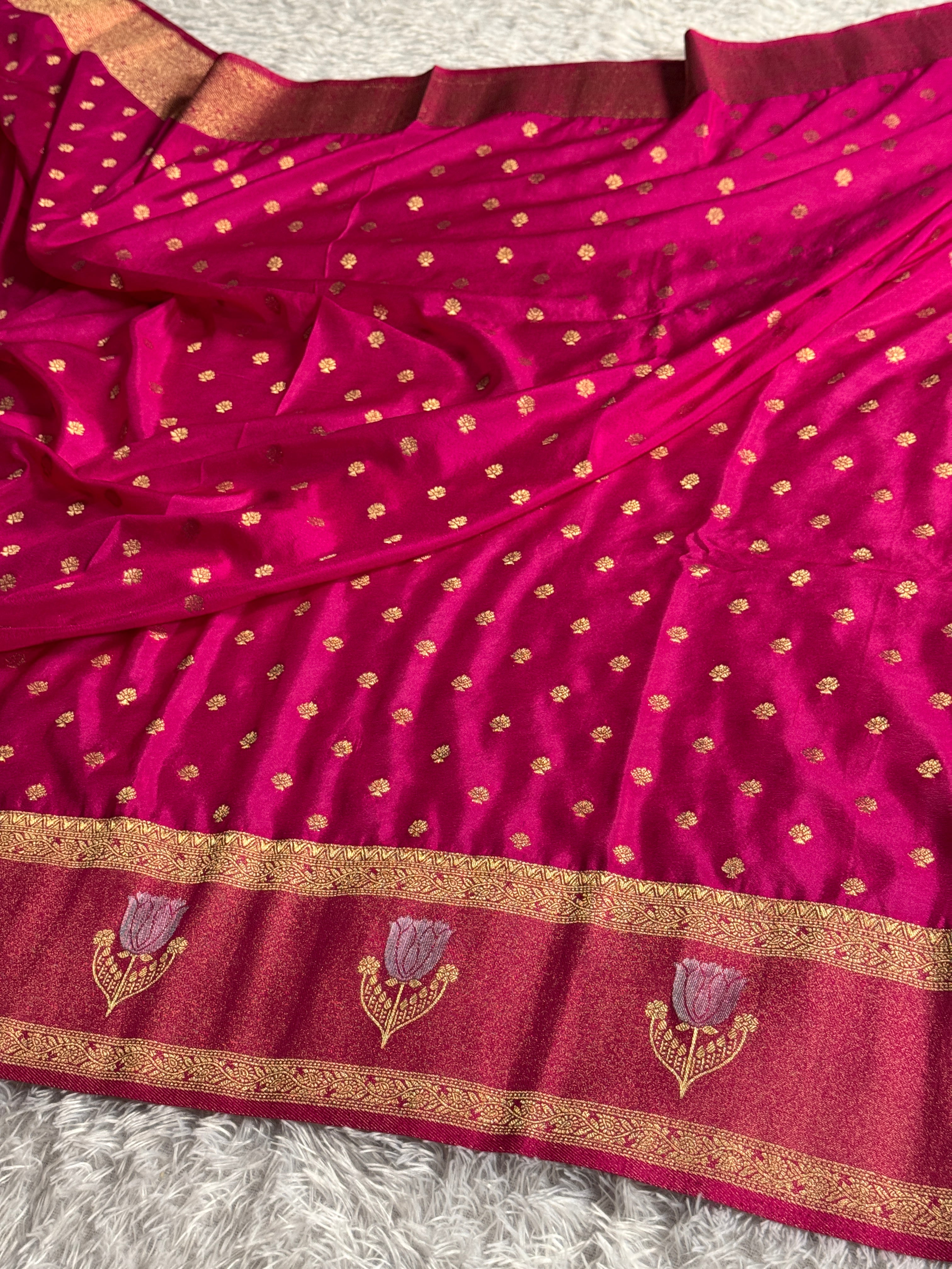 Product Title:
Rani Pink Semi Crepe Georgette Saree with All Over Buta Woven Design & Rich Zari Pallu | SS52