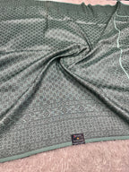 STF50 – Elegant Sea Green Dupion Saree with Embossed Woven Designs